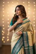Anvitha (ಅನ್ವಿತಾ) – Beige & Teal Green Gadwal Pure Silk Saree