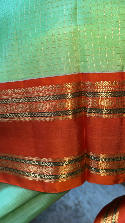 Hemavathi – Elegant Pista Green Korvai Checks Kanjeevaram saree