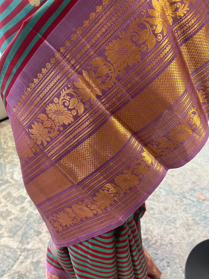 Tanirika (ತನಿರಿಕಾ) – Maroon & Ram Green Stripes with Lavender Pink Gadwal Pure Silk Saree