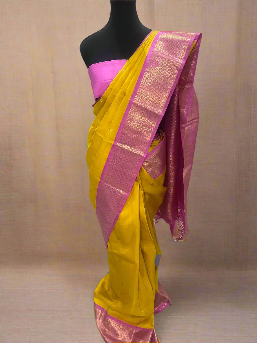 Lalitha (ಲಲಿತಾ) – Turmeric yellow & Powder Pink Korvai Kanjeevaram Pure Silk Saree